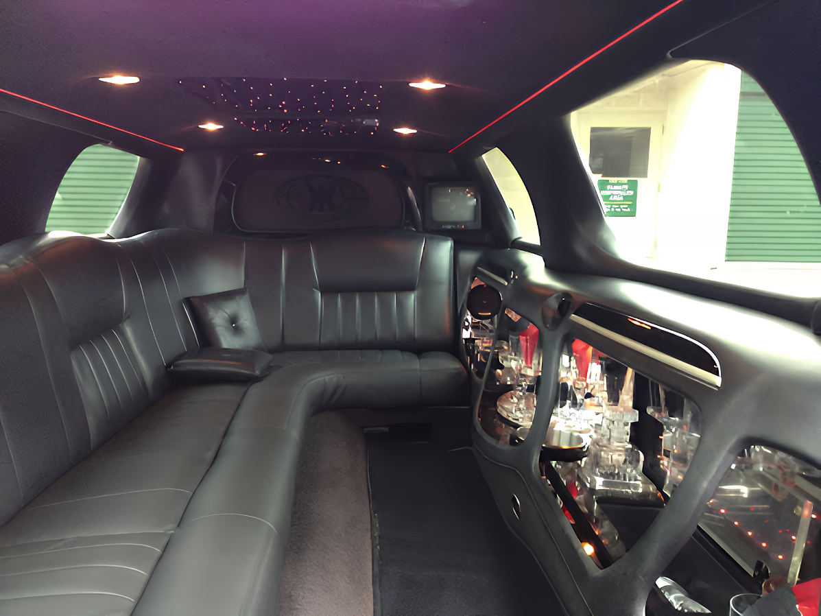 Plush interior of 10-passenger Lincoln stretch limousine with classic styling