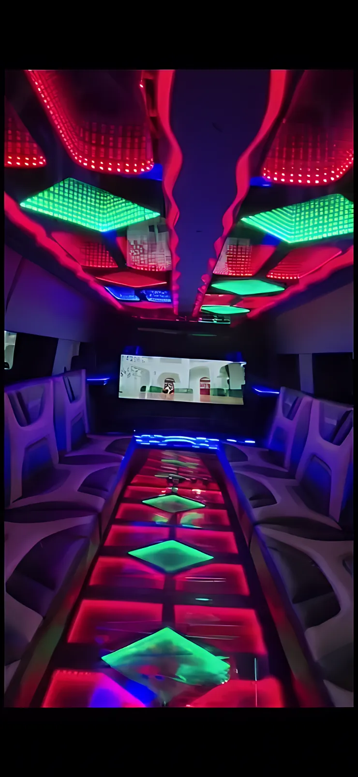 LED-lit interior of 18-passenger Hummer stretch limousine with bar and J-style seating