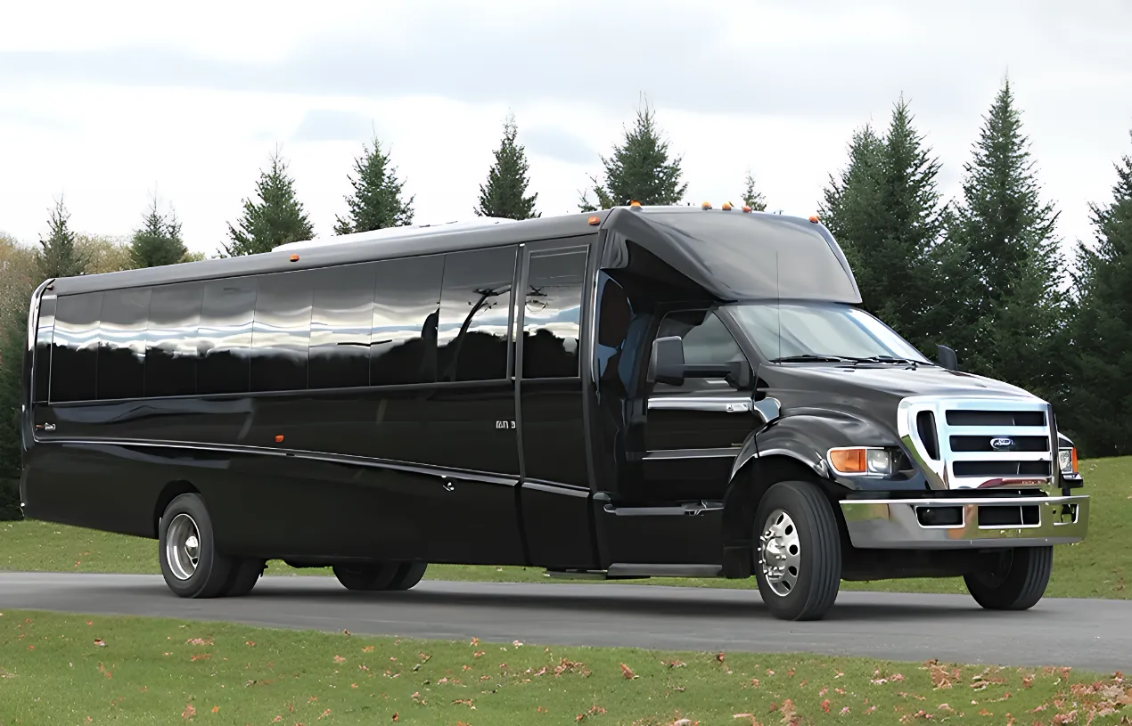 Black 31-passenger executive bus exterior for DFW corporate shuttle and group transportation
