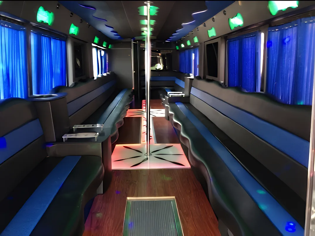 Interior of 45-passenger QTS party bus — maximum capacity luxury party bus in Dallas-Fort Worth with full LED lounge cabin
