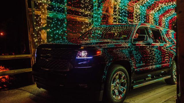 Black SUV for a Christmas light tour in DFW