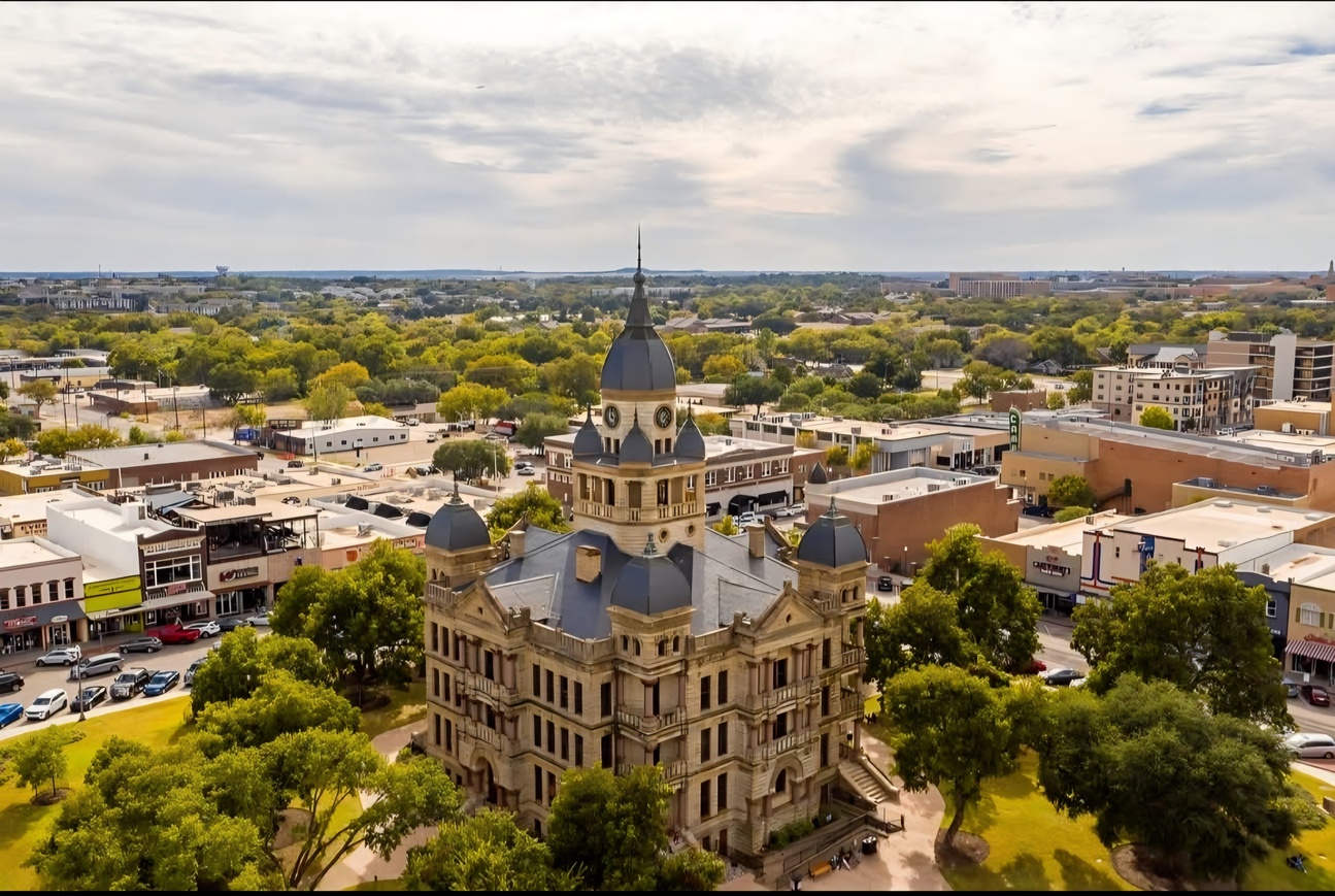Downtown Denton skyline representing Denton County chauffeur service coverage