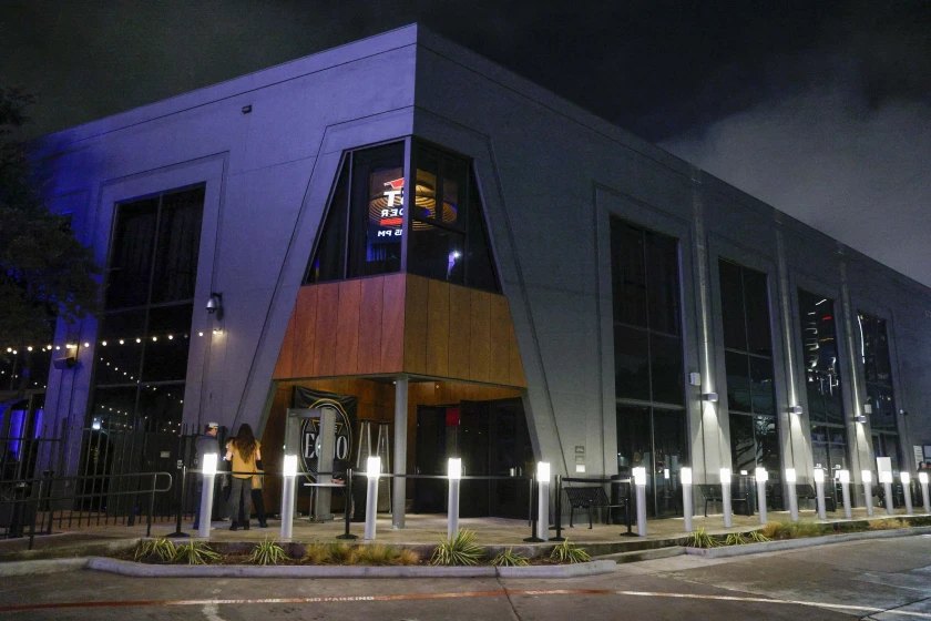 The Echo Lounge & Music Hall exterior at night in the Dallas Design District — QTS Black Car & Limo transportation for September 2026 events