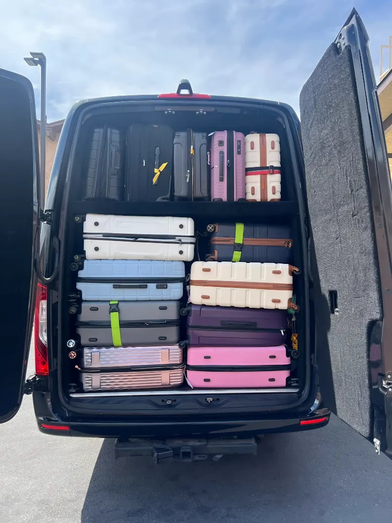 Mercedes Sprinter rear walk-in luggage bay for group airport transfers in DFW