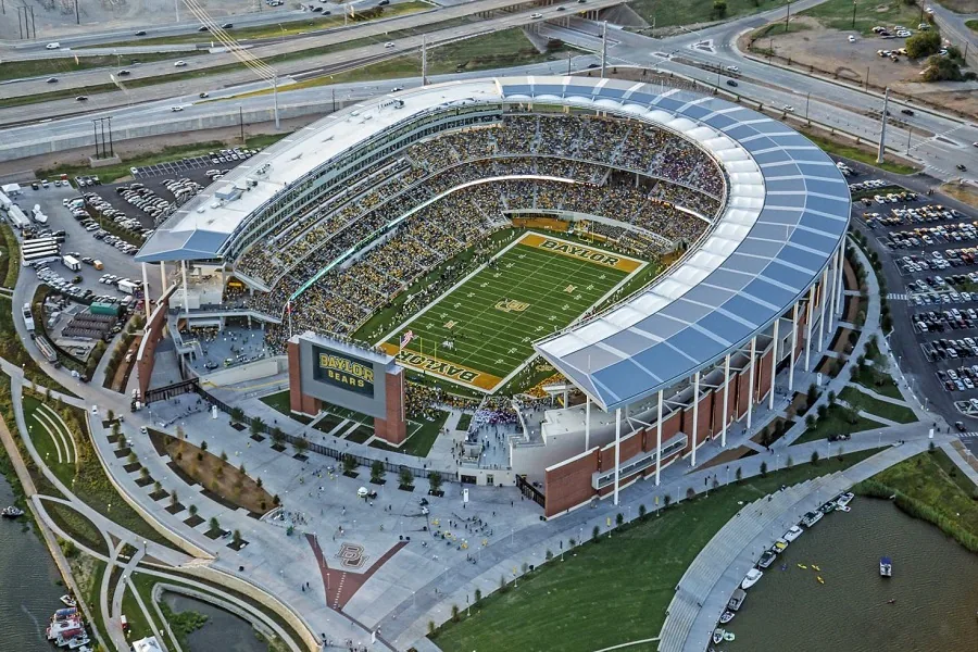 Aerial view of McLane Stadium on the Brazos River in Waco, home of Baylor football — QTS Black Car & Limo transportation for September 2026 events