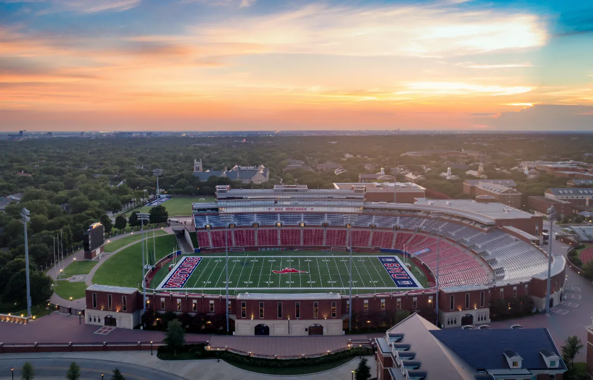 Aerial view of Gerald J. Ford Stadium at SMU in Dallas for Mustang game day black car transportation