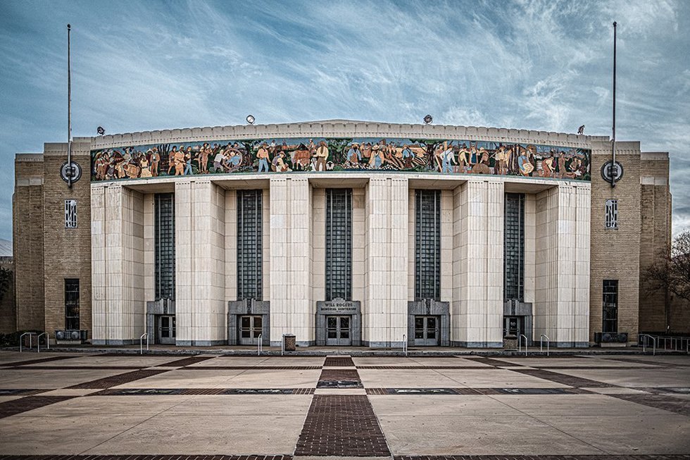 The Art Deco facade and mural frieze of Will Rogers Memorial Auditorium in the Fort Worth Cultural District — QTS Black Car & Limo transportation for September 2026 events